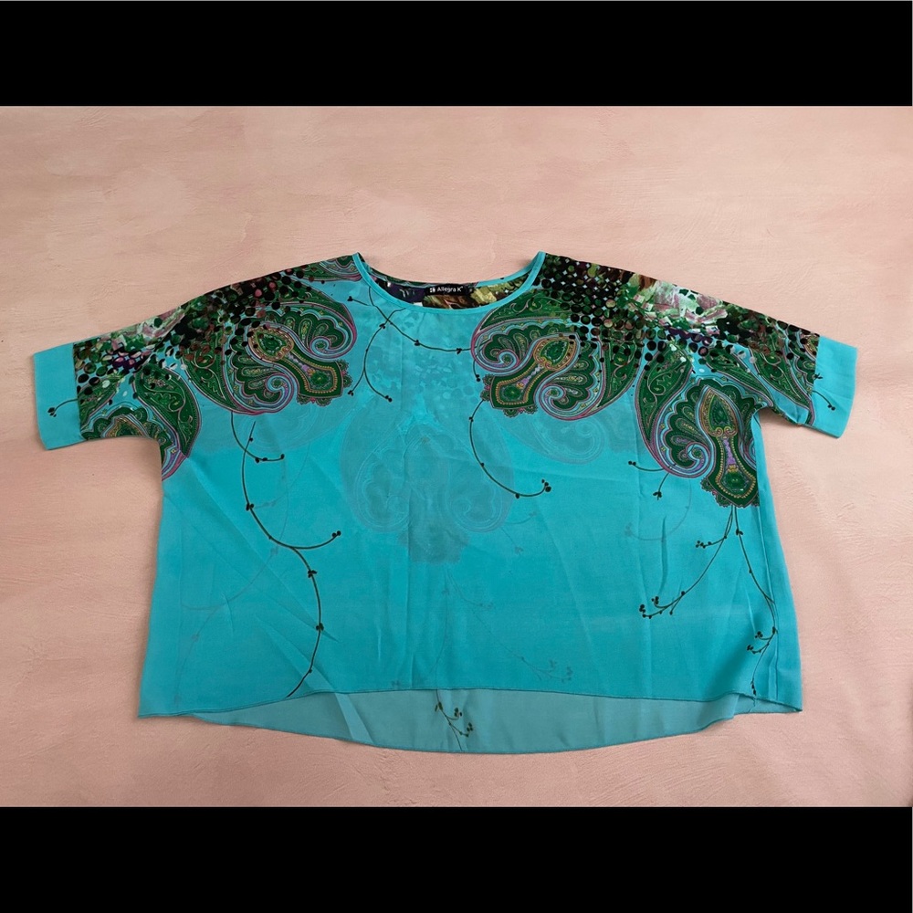 Beautiful green blouse with nice designs